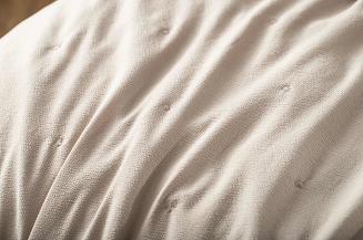 Poszewka fakturowana struktura do narzuty Dotta 50x70 mocca z haftem kropek