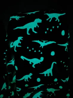 Koc świecący w ciemności 150x200 fluorescencyjny dinozaury biały niebieski
