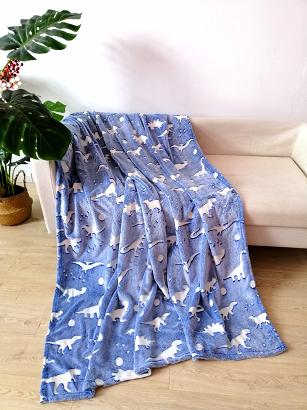 Koc świecący w ciemności 150x200 fluorescencyjny dinozaury biały niebieski