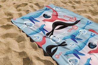 Ręcznik plażowy 100x180 błękitny kolorowe foki