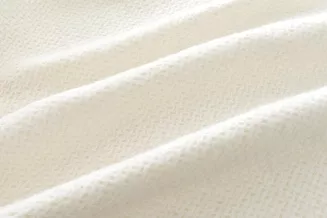 Koc bawełniano-akrylowy PURE 150x200 kremowy jacquard gofrowy wzór z frędzlami