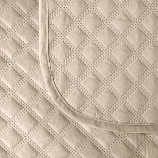 Narzuta dekoracyjna VELVI 70x160 pikowana w geometryczny wzór jasnobeżowa