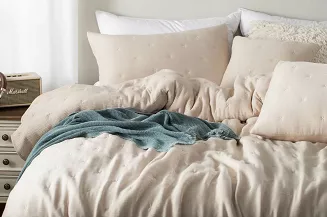 Poszewka muślinowa struktura do narzuty Stella 50x70 beżowa z haftem krzyżyków