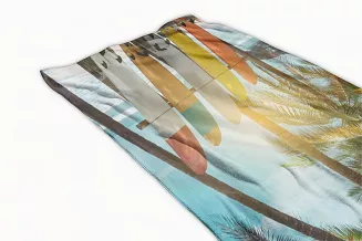 Ręcznik plażowy 100x180 wielokolorowy deski surfingowe w cieniu plam