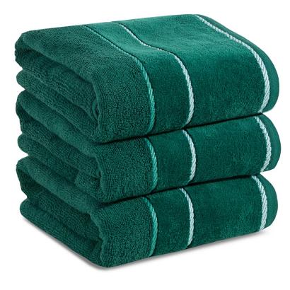 Ręcznik bawełniany z welurową bordiurą w ozdobne paseczki NEL 70x140 Eurofirany ciemnozielony