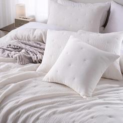 Poszewka muślinowa struktura do narzuty Stella 50x70 kremowa z haftem krzyżyków