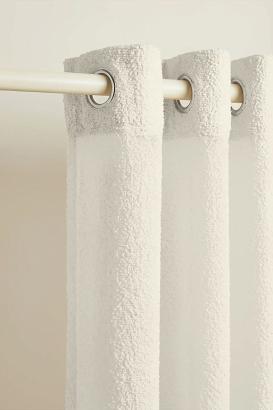 Zasłona gotowa na przelotkach Dreamy Boucle 140x250 kremowa o strukturze boucle