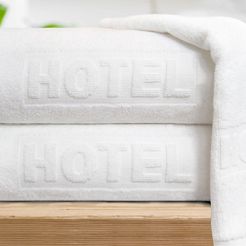 Ręcznik hotelowy Frotex Baden-Baden 70x140 biały z napisem HOTEL