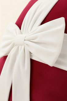 Poszewka dekoracyjna świąteczna 45x45 Christmas Bow welurowa czerwona z białą kokardą