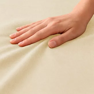 Prześcieradło jersey z gumką 140x200 kremowe