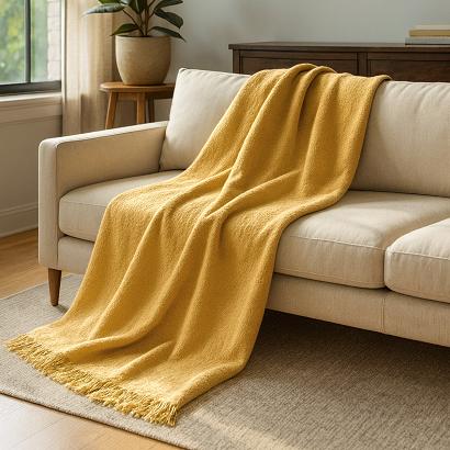 Koc bawełniano-akrylowy 150x200 musztardowy z frędzlami