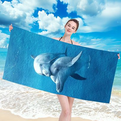 Ręcznik plażowy 100x180 niebieski delfiny