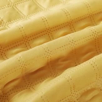 Narzuta dekoracyjna RUFFY 160x220 pikowana z falbanką musztardowa