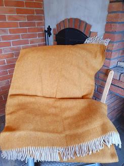 Koc wełniany jednobarwny z frędzlami miodowy