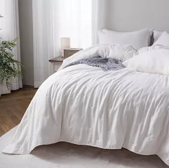 Narzuta dekoracyjna fakturowana Dotta 160x220 kremowa z haftem kropek