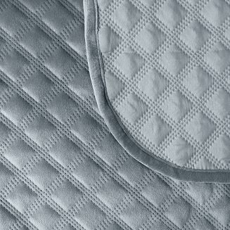 Narzuta dekoracyjna VELVI 170x210 pikowana w geometryczny wzór niebieska