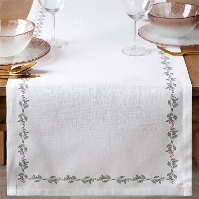 Bieżnik dekoracyjny wodoodporny LILY 40x140 Eurofirany biały zielony wzór botaniczny na brzegach