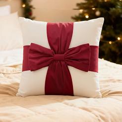 Poszewka dekoracyjna świąteczna 45x45 Christmas Bow welurowa biała z czerwoną kokardą