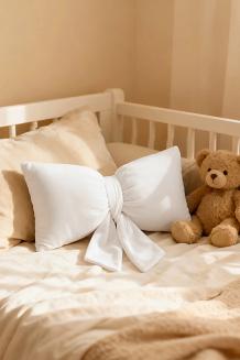 Poduszka dekoracyjna świąteczna 35x20 welurowa biała kokarda